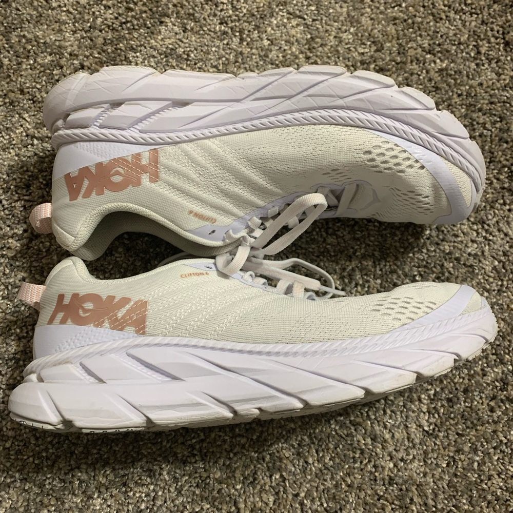 Hoka white athletic shoe